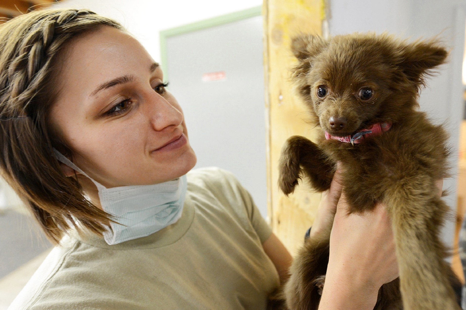 A woman and her puppy